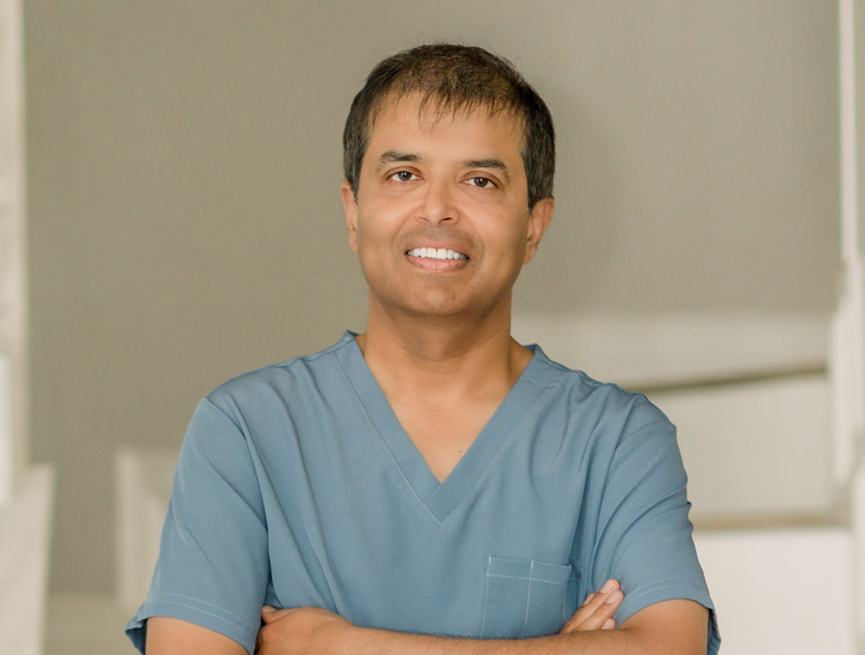 Dr. Rajiv Rugwani Performing an Eye Exam